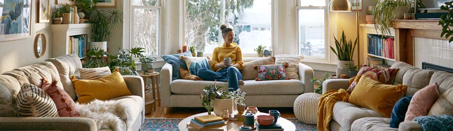 person relaxing by a window